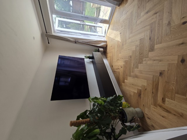 Room with herringbone flooring visualised by AI